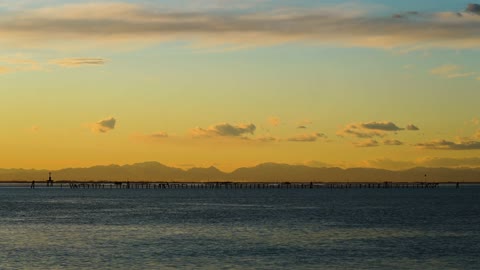 A Beautiful Time Lapse Video of a Sunset on the Sky Line at Dusk.