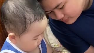 Little brother shares food with him, he is very cute