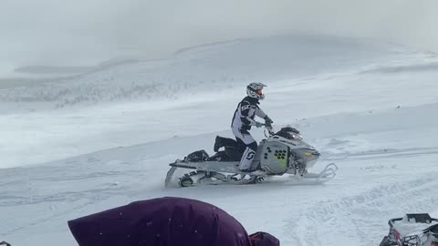 Snowmobiling Climb Sets off Avalanche