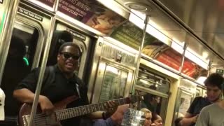 Guy singing lil jon yeah on subway guitar