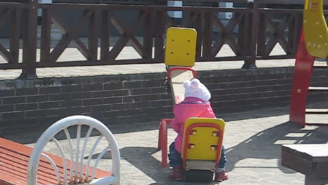 Nobody rolls on the swing. The baby found a way out.