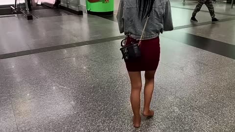 Milf walking at the train station...