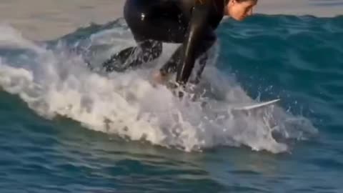 woman surfing