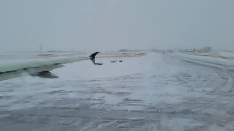 Icy takeoff roll from DEN