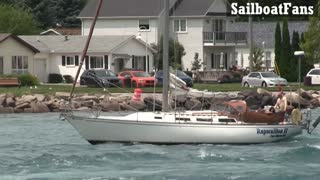 Rapscallion II Sailboat Cruising Down St Clair River In Great Lakes