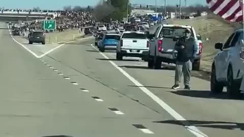 Patriots line the route to show support for the freedom convoy
