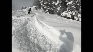 Skiing off a 20 foot cliff