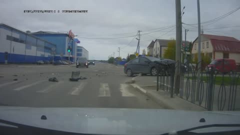 Car Runs Red Light and Gets Sideswiped