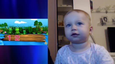Adorable baby reacts to "Five Little Speckled Frogs", by LittleBabyBum