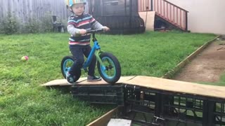 Collab copyright protection - small boy ride bike on homemade ramp