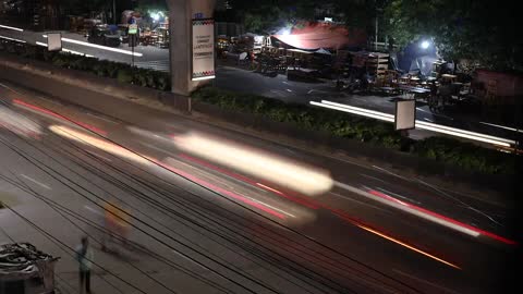Street vehicles pass through the street, time-lapse photography
