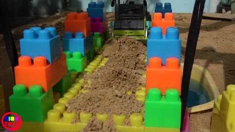 Truck video for kids - Bridge assembly for children - Building toys