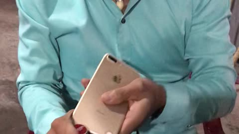 Guy Attempts To Open Bottle With IPhone