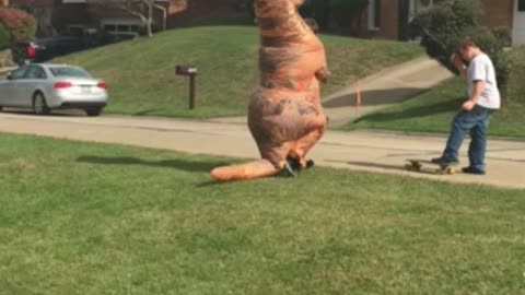 Just a dinosaur on a skateboard