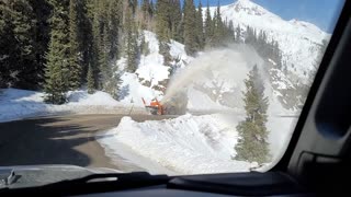 Driving Under a Snow Plow's Spray