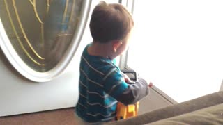 Toddler hilariously makes chainsaw noises with his chainsaw toy