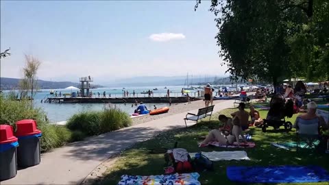 La stupenda ZURIGO in SVIZZERA tedesca(STATO EXTRACOMUNITARIO)tra i suoi parchi e spiagge sul lago e il centro storico DOCUMENTARIO il salario minimo è di 5-6000 franchi lordi,in media va dai 7-10000 franchi lordi,affitto ti chiedono anche 2000 franchi.