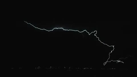 slow motion lightning strikes captured by storm chaser Dustin Farrell