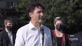 Trudeau addressing people at political rally