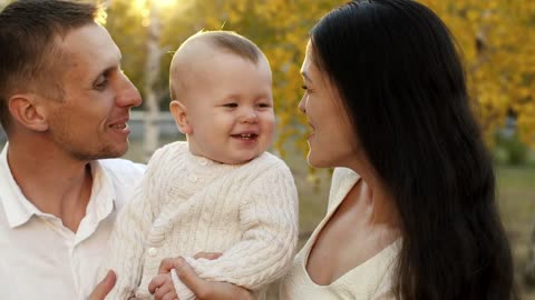 Happy family with a small baby