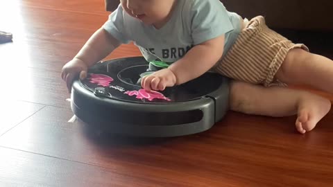 Ollie the Baby Loves Riding Our Roomba “Rhonda”