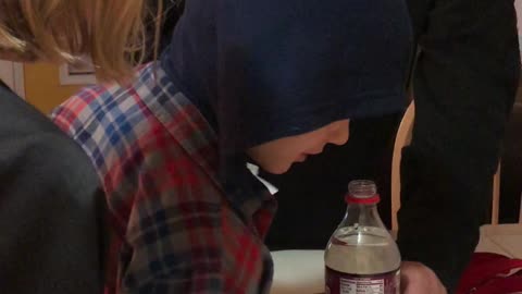 Boy Bamboozled by Water Bottle Penny Prank