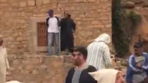 A Lively Scene As Jewish Travellers Sing And Dance In Morocco