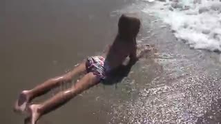 child playing in sea sand beach little girl on tropical exotic sea coastline