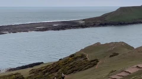 People Stranded on Tidal Island in Wales