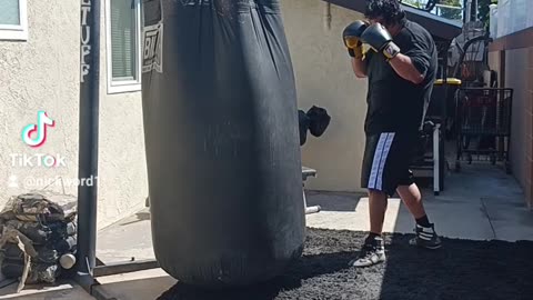 500 Pound punching bag workout part 87. working the one two