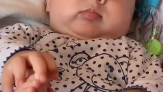 Baby Gets Startled by Sudden Noise