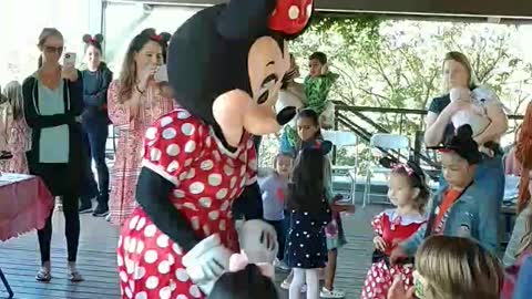 Hot dog dance at cane island with new pals at a birthday party with Mrs Mouse mascot minnie