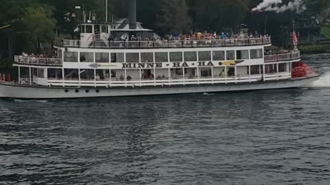 Steam boat cruise passing by lake george