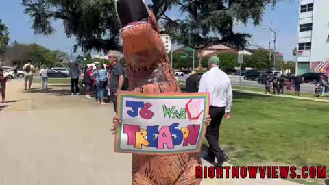 Counter protester in Dino costume at BH Trump Rally