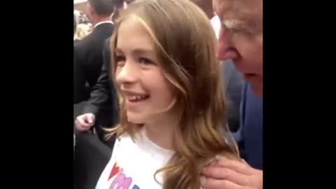 Creepy Joe strikes again! Biden sneaks up behind girl, grabs her shoulders