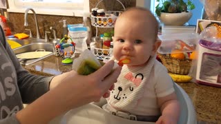 Cute Baby Accidentally Gets an Eyeful of Baby Food