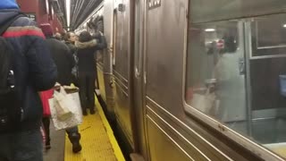 Guy comes out of subway through window door broken