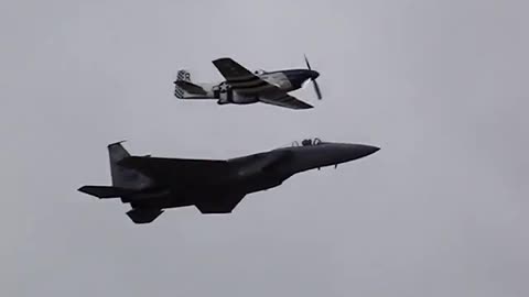 F-15 Eagle and P-51 Mustang Flying in Formation