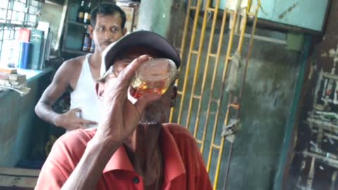 90 years old Indian man finished full bottle rum in 2 seconds
