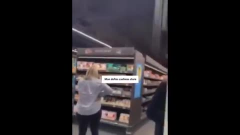 Man Pays With Money In Cashless Store