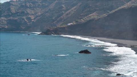 beach with black volcanic sand at nord coast of tenerife island canary islands atlantic ocean spain