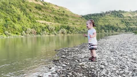 Cute_Baby_Walks_on_the_River_For_the_First_Time._Funny_Video