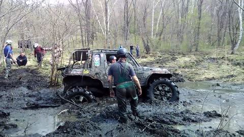 Trophy- raid Shkotovskaya carousel . Suzuki Proto, Suzuki Jimny in swamp,