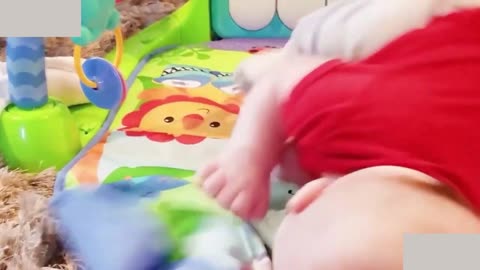 Baby fan with cute cat and play together