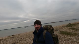 Vlog while walking on a shale/stoney beach