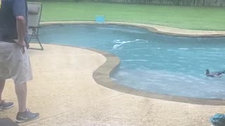 Dude and His Duck Play by the Pool