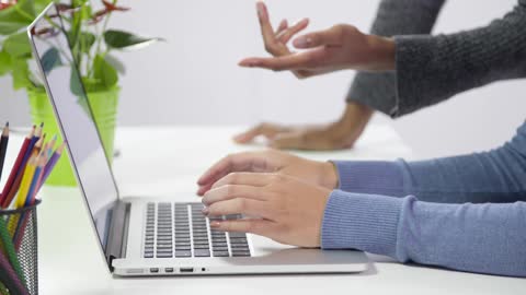 Women Working on Laptop CU Hands