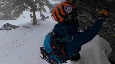 Man Uses Rockface to Avoid Avalanche