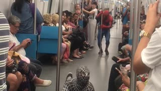 Red spiderman and black and white spiderman dancing