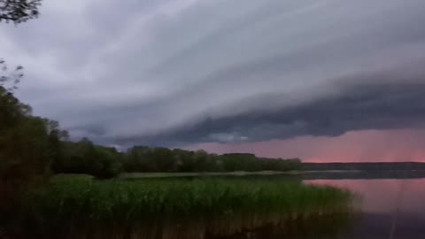 Storm clouds 💭 over the lake.